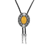 Bolo tie med oval sten och vågformad ram