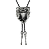 Bolo tie med tjurskalle i oljesköld och läderband