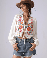 Broderad blus med blommor