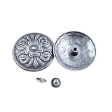 Concho med antikt blomrelief