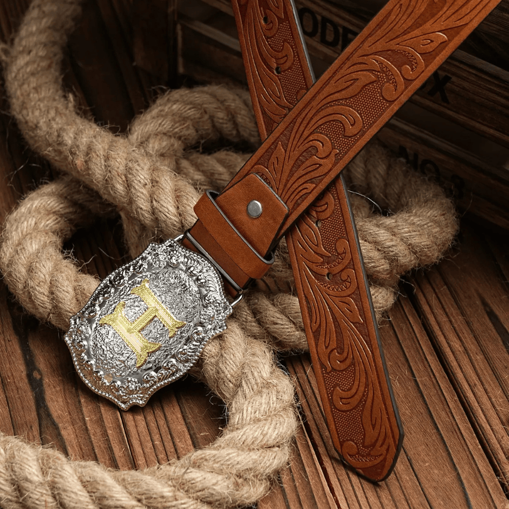 Cowboybälte med gyllene bokstav