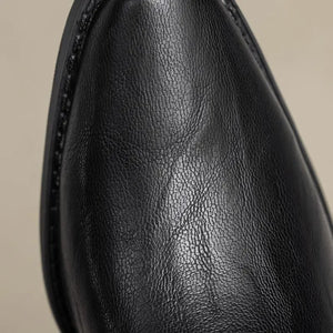 Cowboyboots i mjukt läder med elegant spänndetalj