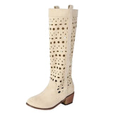 Cowboyboots i mocka med utskuret mönster och rund tå