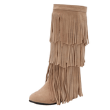 Cowboyboots med lager av mockafransar och mjuk kilklack