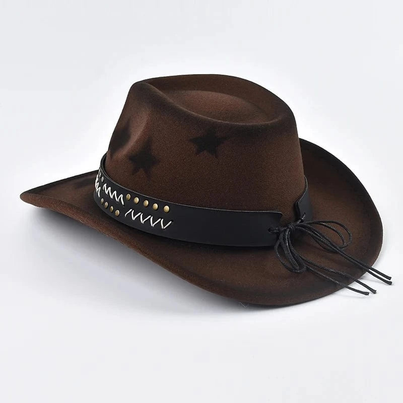 Cowboyhatt med stjärnmönster och dekorerat bälte