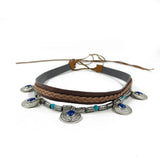 Cowboyhattband med flätad rem och blå stenanhäng