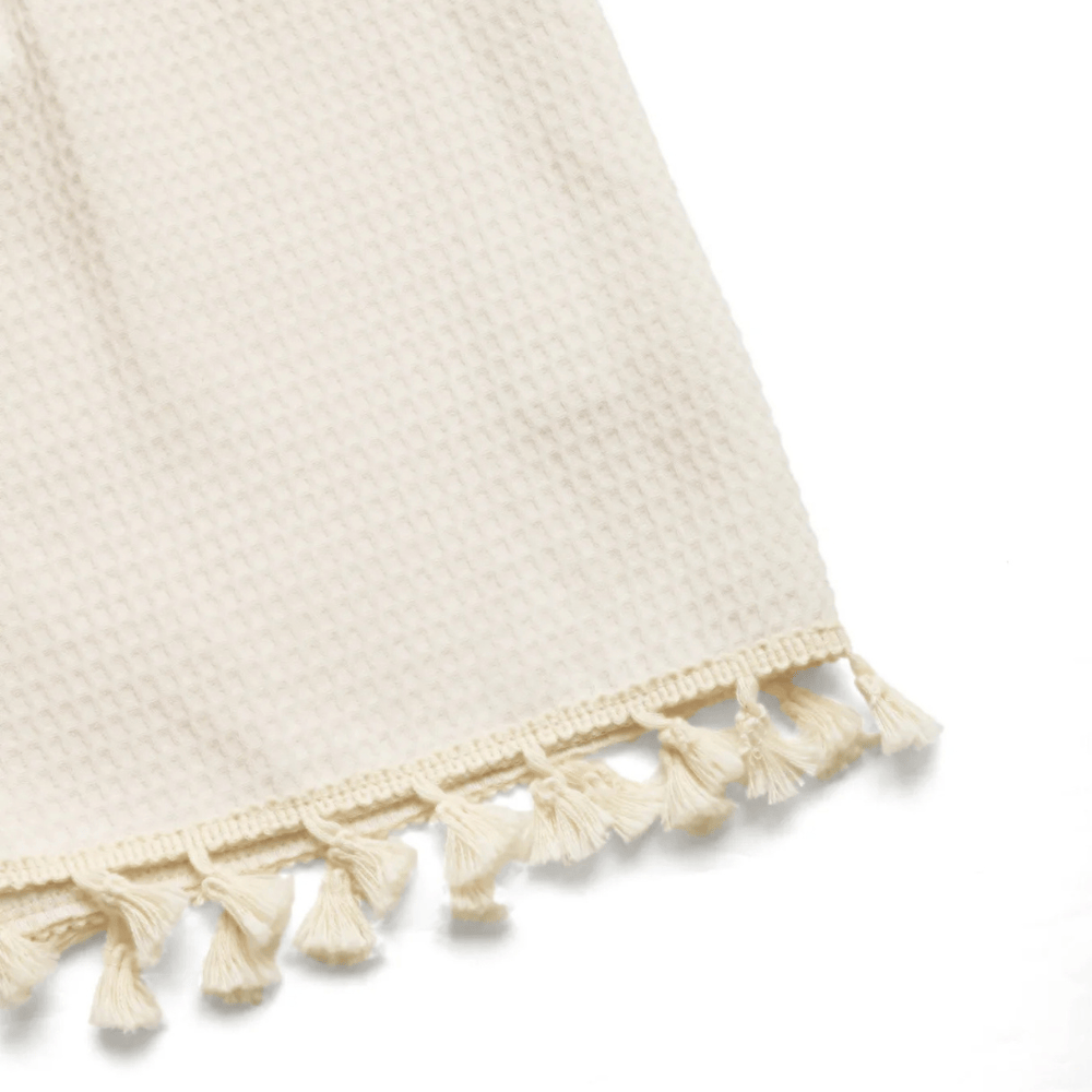 Kort byxdress med knytning fram