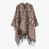 Öppen poncho med blommigt jacquardmönster