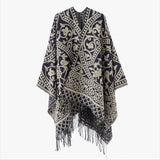 Öppen poncho med blommigt jacquardmönster