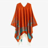 Poncho med fransar