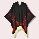 Poncho med fransar