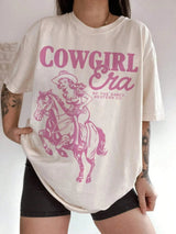 Tshirt med rosa cowgirltryck "Cowgirl Era"